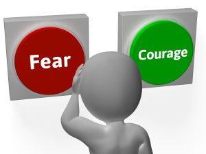 Fear Courage Buttons Showing Scary Or Unafraid
