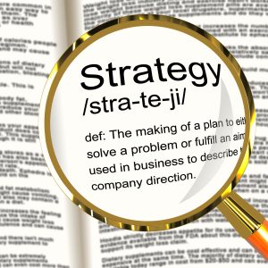 Strategy Definition Magnifier Shows Planning Organization And Leadership